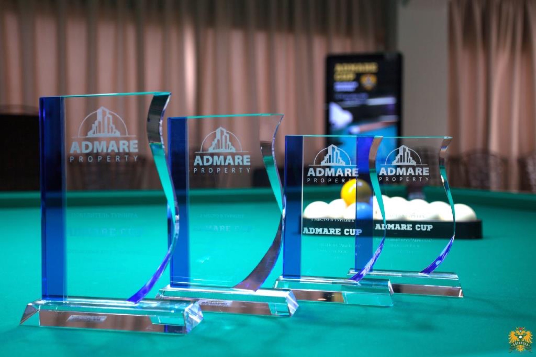 Кубки турнира Admare Cup на бильярдном столе